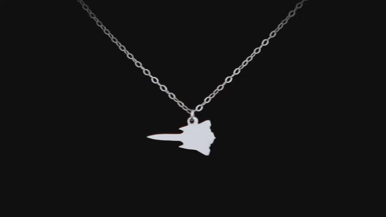 Load video: Image of a Sterling Silver C-130 Airplane Pendant going back and forth on a turntable