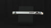 United States Air Force USAF sterling silver tie bar with an engraved B-2 Spirit Bomber Jet on a turntable with a dark background