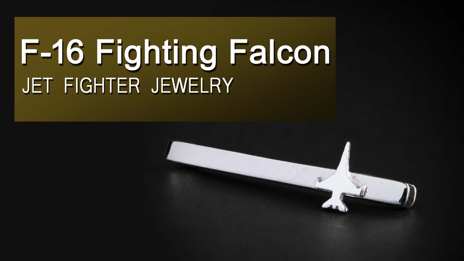 Load video: Video of a sterling silver F 16 military aircraft tie bar motif 