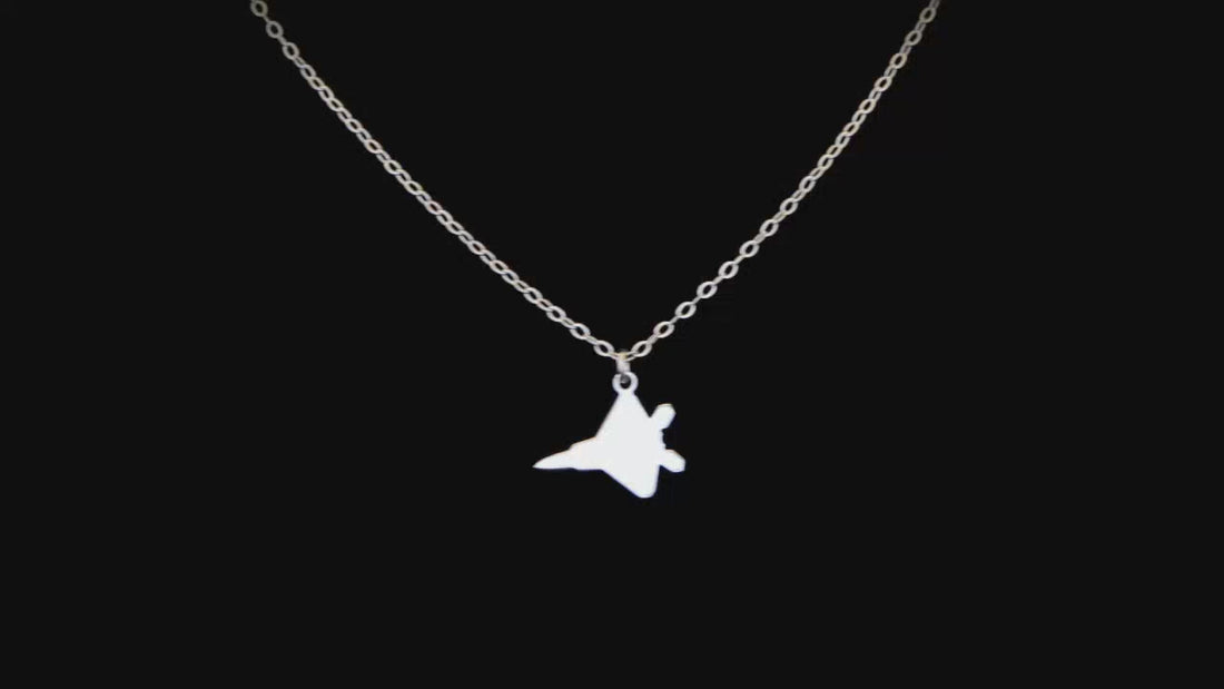 F-22 necklace made by Jet Fighter Jewelry video on a black background