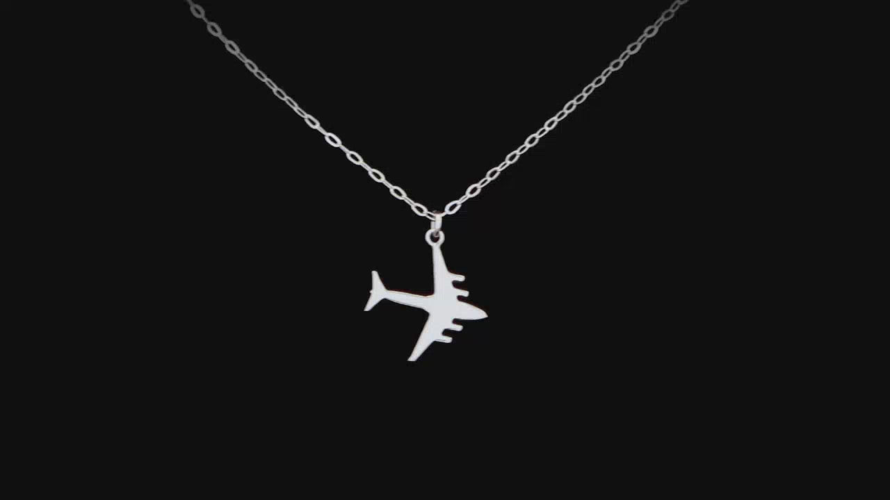 Load video: Image of a Sterling Silver C-130 Airplane Pendant going back and forth on a turntable