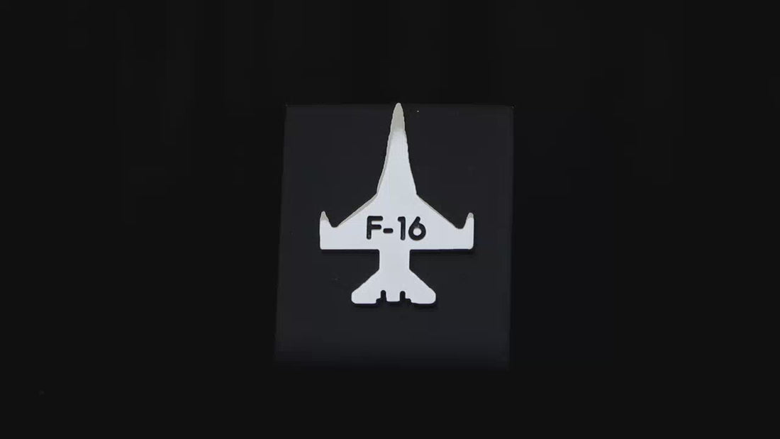F-16 Fighting Falcon tie tack on a black background