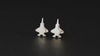 Pair of sterling silver F-35 fighter jet stud earrings on a turntable with a dark background